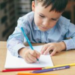 A boy draws