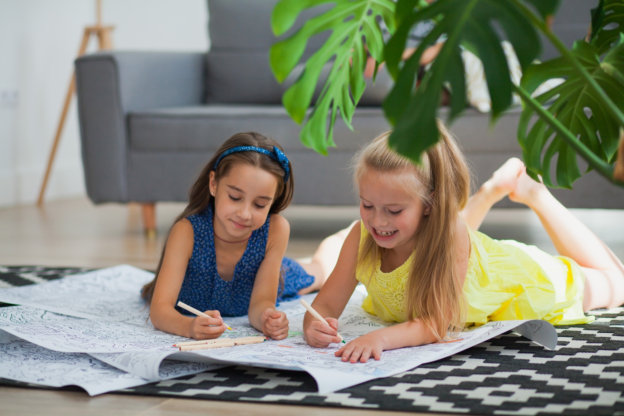 Gen z children play and draw on coloring book