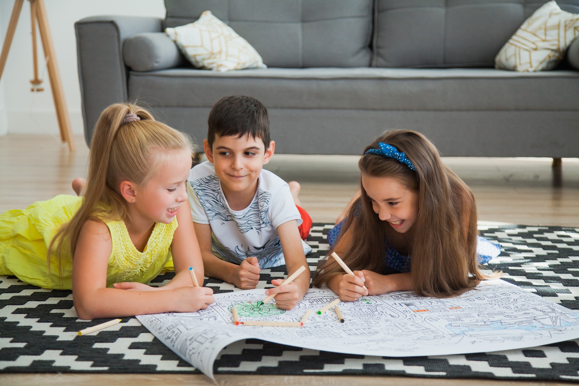 Gen z children play and draw on coloring book